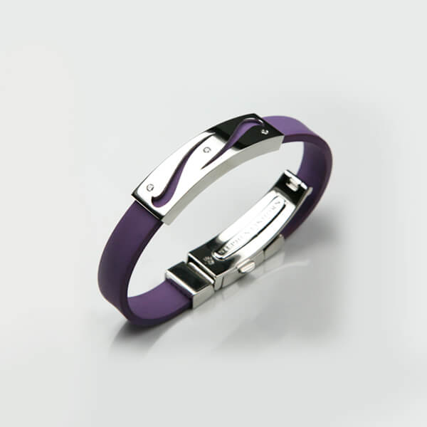 A bespoke platinum and purple rubber ID wrist cuff set with three diamonds.